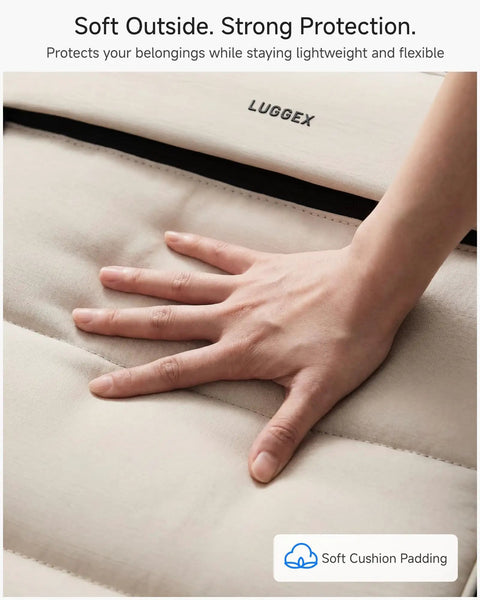 Hand pressing soft cushioning on Underseat Carry On Luggage With Smooth Spinner Wheels, Lightweight Softside Suitcase, beige interior.
