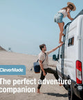 Man helping woman climb van ladder on the beach, carrying Pacifica Collapsible Cooler Bag Medium Portable Insulated Cooler