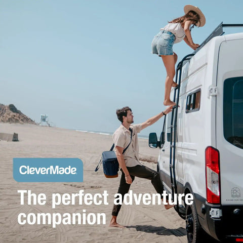 Man helping woman climb van ladder on the beach, carrying Pacifica Collapsible Cooler Bag Medium Portable Insulated Cooler