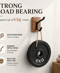 Rustic Wood Adhesive Wall Hooks Four Pack Heavy Duty Sticker Hangers Fits Coats Towels And Bags Smooth Farmhouse Look Easy Peel Stick Mount For Entryway Bedroom showing strong load-bearing hook with 6kg weight.
