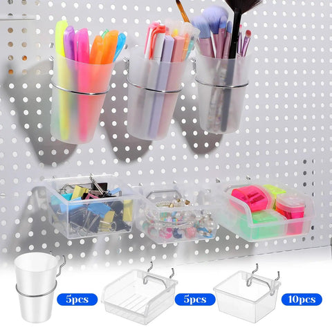 20 Piece Pegboard Organizer Set With Bins Cups Hooks And Loops For Garage Workshop Workbench And Office Pro Grade Clear Pegboard Storage System with pens, markers, and small items displayed in bins and cups on a pegboard.