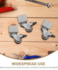Rugged Swivel Furniture Casters With Gliding Silent Rollers And Tough Round Plates built for cabinets and drawers on workspace.