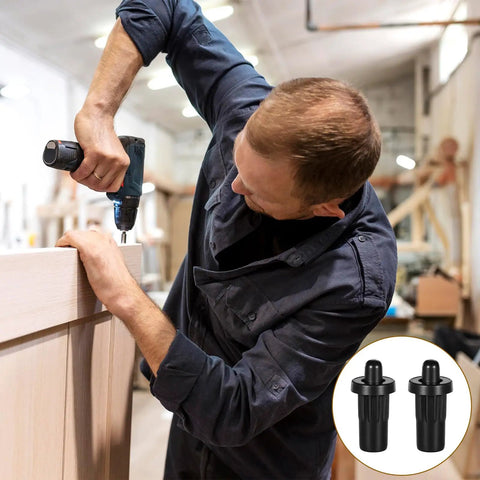 Man using a drill to install a 20 Piece Set Of Black Spring Loaded Cabinet Damper Pins Straight Action Hinge Rods For Door Repairs And Floating Shelves Sturdy Grip Hardware No Sweat Fix.