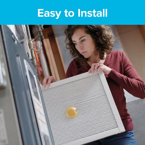Woman installing Smart Air Filter 20x24x1 MPR 1900 MERV 13 1-Inch Premium Allergen Bacteria And Virus Filter For ACs And Furnaces