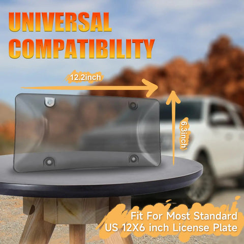 Two Pack License Plate Cover Protector For American Cars, Tough As Nails Polycarbonate Shield With Smoke Gray Finish shown on table