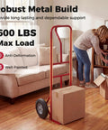 Heavy Duty Metal Hand Truck With 600 Pound Capacity And Ergonomic P Handle, shuffles a box on hardwood floors.