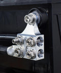 Eight Way Battery Terminal Distribution Block For Lithium Or Agm Batteries Featuring Four Awg Hole Holders Plus Threaded Studs, compact silver hub on battery.