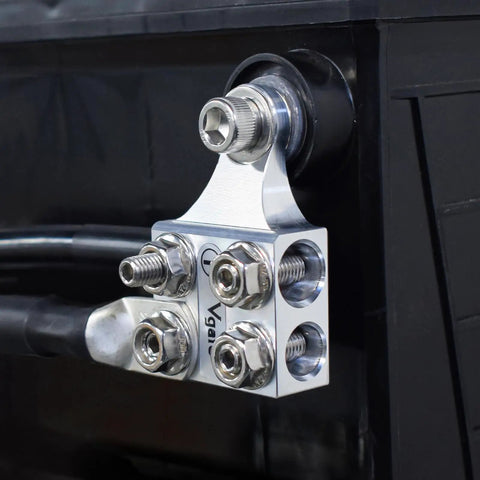 Eight Way Battery Terminal Distribution Block For Lithium Or Agm Batteries Featuring Four Awg Hole Holders Plus Threaded Studs, compact silver hub on battery.