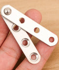 Close-up of stainless steel 360 Degree Door Pivot Hinge Set For Furniture Cabinets, showcasing pivot holes and premium build quality.