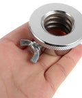 Hand holding steel part of Two Pack Steel Barbell Collars And Dumbbell Clamps With Anti Slip Screw Locks, Easy Tightening For Weightlifting