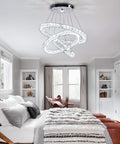 Modern LED Crystal Ring Chandelier Pendant Light With Three Rings, Adjustable Hanging Height 12 To 48 Inches, cool white 4500K in bedroom