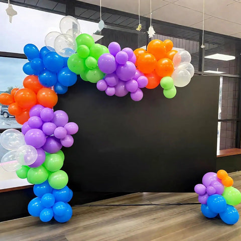 Epic Balloon Arch Kit 122 Pcs Colorful Balloon Garland Set in purple, dark blue, green, orange, transparent at a science birthday party.