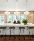 Vintage Brass Milk Glass Pendant Light 13.8in White Pleated Chandelier, E26 above a kitchen island with bar stools.