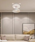 Heavy Duty Electric Chandelier Hoist With 220 Lb Load Capacity And 26 Ft Lift Stroke For Ceiling Fixtures Featuring Durable Steel Build, installed in a modern living room with stylish decor.
