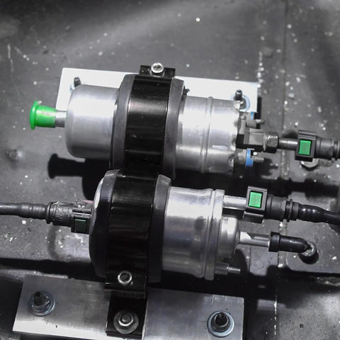 Badass 50mm Aluminum Fuel Filter Mounting Bracket And Lock Tight Fuel Pump Clamp Holder With Thick Rubber Cushion Pad Universal Auto Part For Sedan Suv Truck Hella Secure On Rough Roads, featuring dual fuel pumps on a metal mount.