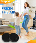 Woman and child dancing in living room with vacuum in background, highlighting 4-Pack Washable Vacuum Filter for CleanView Rewind.
