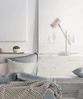 Playful Glam Desk Lamp With Adjustable Height And Balance Arm, Matte Pink Finish With Brass Accent And Terrazzo Base on desk