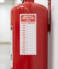 30 Pack Pro Grade Equipment Maintenance Inspection Stickers 5 By 3 Inch Monthly Log Labels For Workplace Compliance attached to red cylinder
