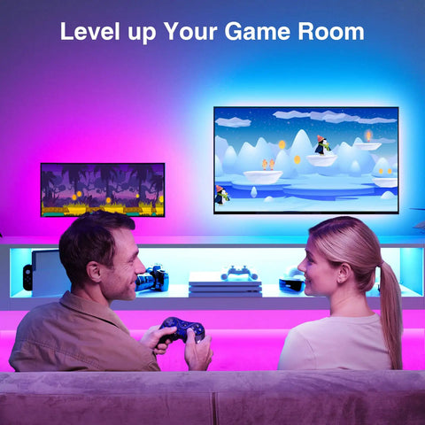 Two people gaming in room lit by Smart TV LED Backlight Strip 9.2Ft RGB Mood Lighting With WiFi App Control