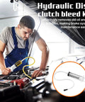 Mechanic using Three Piece Reverse Brake Bleed Kit With 100ml Syringe And 50cm Hose for easy car brake maintenance.