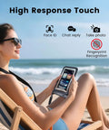 Woman using IPX8 Waterproof Pouch 2 Pack With Lanyard Double Window Dry Bag Case at the beach, phone in waterproof pouch.