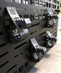 Rugged Truck Shovel Holder With Quick Release Rubber Clamp Mount Kit on perforated panel
