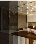 Dim room with chandelier showing dimmable effect of Dimmable Anti Glare G25 Globe LED Bulb Dope 7W 75W Eq E26 Silver Dipped Half Chrome Top, 3000K Warm White, UL Listed Bathroom Vanity Mirror Lighting, Pack Of 6.