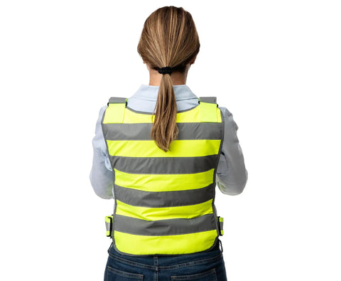 Back view of Hi Vis yellow vest from Professional Ice Vest Cooling System With 96 Pure Water Ice Cubes, worn by woman, in jeans and shirt.
