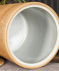 Inside view of No Fuss Ceramic Rice Dispenser Jar With Lock Tight Lid, showing smooth ceramic finish for bulk storage.