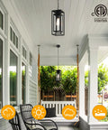 Dope 14 Inch Outdoor Pendant Light For Front Porch Featuring Adjustable Six Foot Chain And Sleek Vintage Metal Shade For Patio Entryway Hanging Lamp above a swing on a porch.