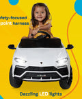Child driving white Lamborghini Urus Licensed 12V Ride On Car For Kids With Parent Remote Realistic Open Doors LED Headlights Horn Radio AUX