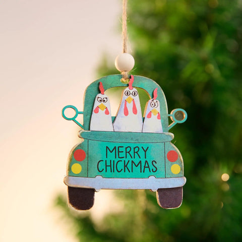 Chickmas Farmhouse Style 3D Wooden Christmas Ornament Four Inch Hanging Chicken Decor featuring chickens in a truck with Merry Chickmas sign.