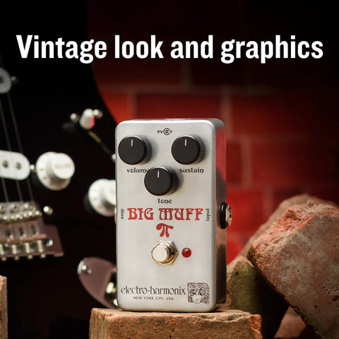 Ram's Head Big Muff Pi Fuzz Pedal With True Bypass And Battery Included, Vintage Look And Graphics on brick surface beside guitar