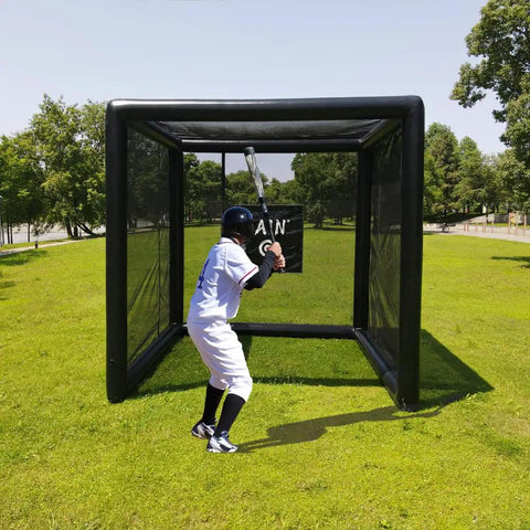 Teen practicing in Inflatable Batting Cage For Baseball And Softball, Instant Pop-Up 10 Ft By 10 Ft By 10 Ft Backyard Training Cage