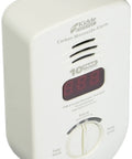 Living Area Plug In Carbon Monoxide Detector Alarm With Sealed Lithium Battery Backup And Digital Display Auto Dims In Low Light 10 Year Battery Life And Peak Level Alerts, shown with digital display in front view.