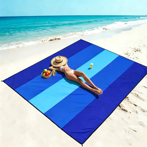Woman relaxing on Mega Waterproof And Sandproof 10 By 9 Ft Mat For 2 To 8 People Quick Dry Outdoor Picnic Sheet at the beach