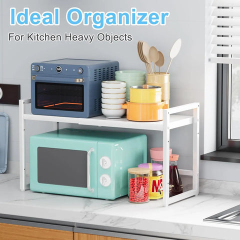 Expandable Kitchen Storage Shelves With Heavy Duty Metal Build, white stackable organizer holding appliances and kitchenware.