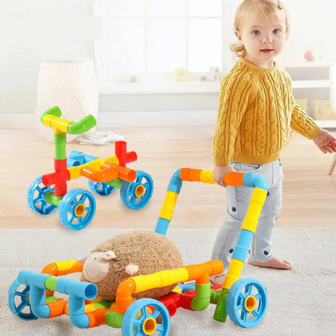 No Fuss Learning 156 Piece Pipe Building Blocks Set with kid pushing colorful toy car made of interlocking tubes.