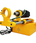 Side view of BREVELTION portable hole drilling machine with yellow frame, motor, rails, and 45–180mm hole diameter