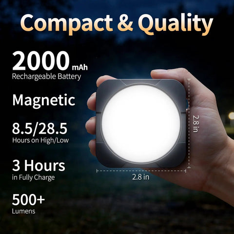 Hand holding Rechargeable Camping Lights Pack Of 2 With 2000mAh Each, Portable LED Tent Lanterns, 2.8 inch size, nighttime scene.