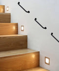 Built Like A Tank Matte Black Stainless Steel Grab Bars 12 Inch Handrail Heavy Duty Safety Rail mounted on staircase wall.