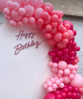60 Piece Hot Pink Balloon Set With Heart Latex Balloons Confetti Balloons And Ribbon Party Ready Decor For Princess Birthdays Baby Showers Weddings Bachelorette Parties And Valentines Day highlighting pink balloon arch with 'Happy Birthday' sign