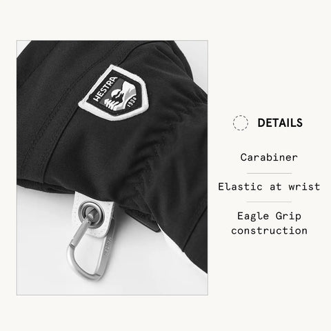 Detail of Army Leather Heli Ski Glove with carabiner, elastic wrist, and Hestra logo, durable five finger snow gear for skiing.