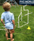 Child playing with PVC structure using Heavy Duty 1/2 Inch PVC Fittings 4 Way Elbow Connector Set For DIY Furniture And Frames UV Resistant 10 Pack.