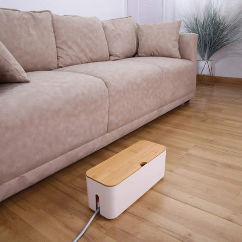 Dual Cable Management Box Set with Small and Large White Cord Hiders for desk or home office use placed on wooden floor