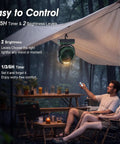 Beast Portable Misting Fan With 36000mAh Battery hanging under a tent, providing cool air and light for outdoor camping