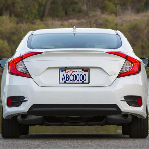 Rear view of white car with license plate secured by Black Anti Theft License Plate Screws Kit With Stainless Steel 1/4 Inch Security Mounting Hardware Includes Caps Inserts Rattle Proof Pads For Car Tags And Frame Mounting Easy Bolt On Tamper Proof Design