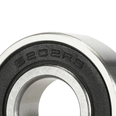 Close-up of a 6202-RS minibike wheel bearing with silver inner and outer races and a black seal