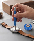 Alloy Steel Watch Bearing Opener With Anti Slip Handle For E2000 Movement Maintenance in use on wristwatch