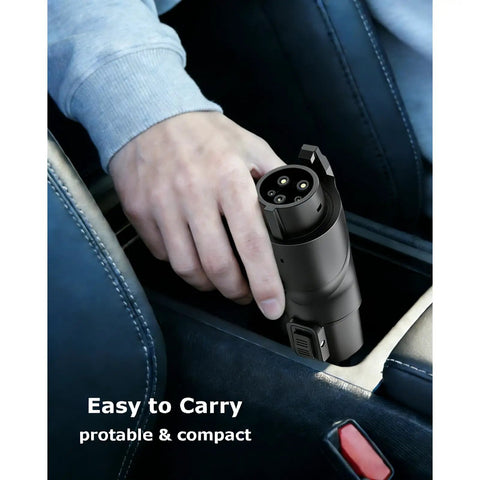 Built Tough Tesla To J1772 Charging Adapter With Secure Lock IP65 Weatherproof Housing displayed in hand for easy transport.